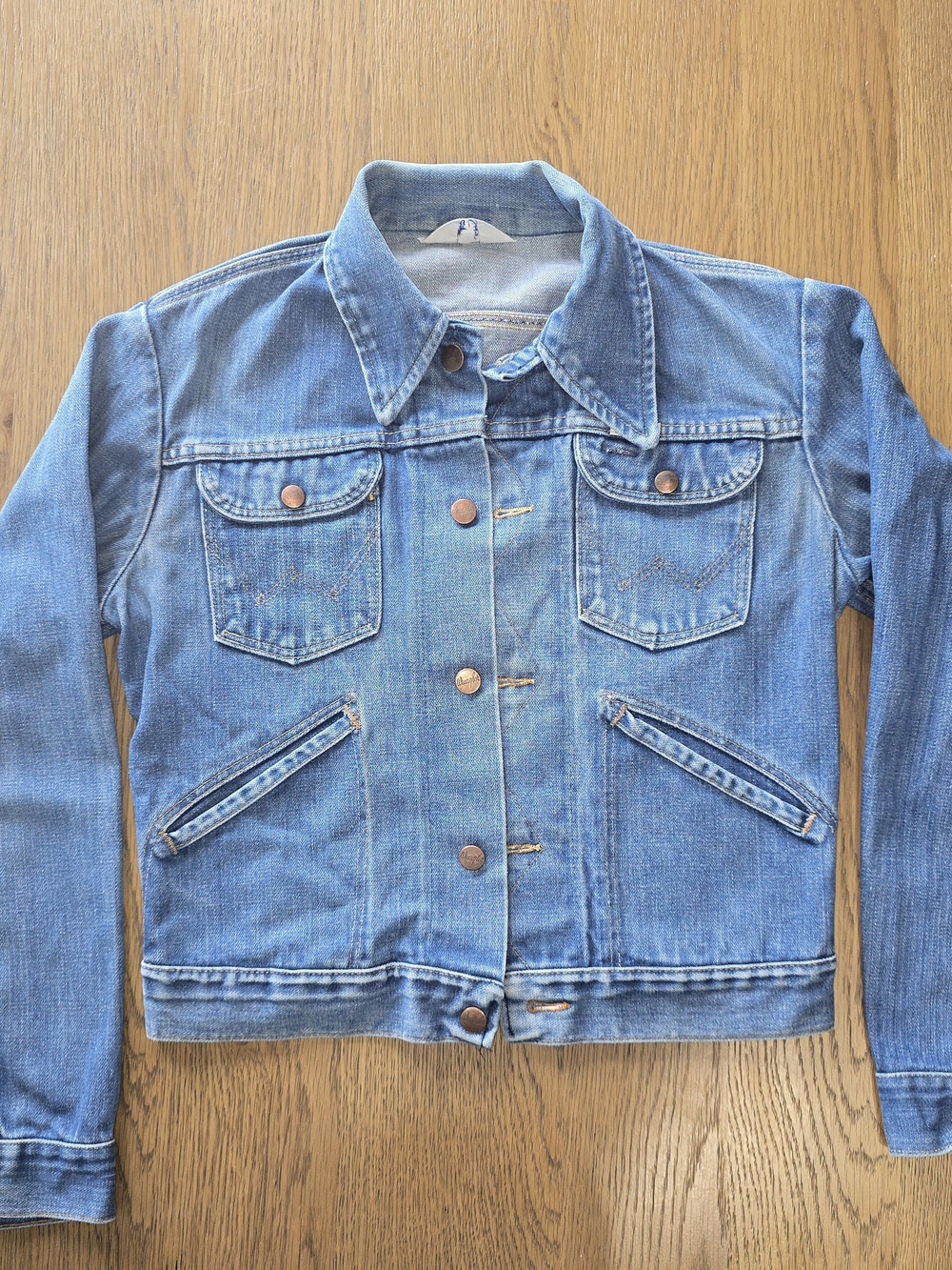 Vintage Wrangler denim jacket featuring distinctive slanted lower pockets and me